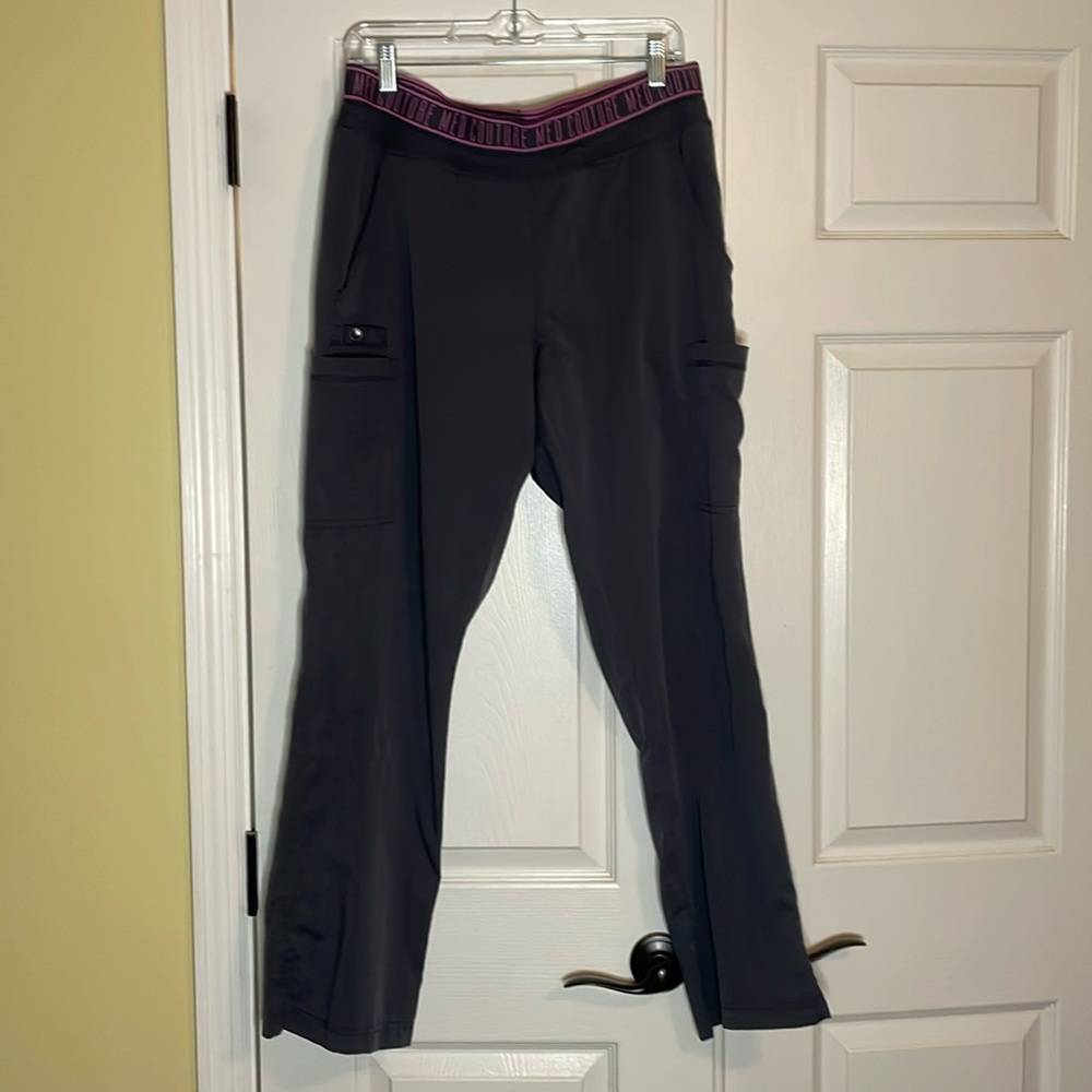 Lightly used med couture touch  gray scrubs.